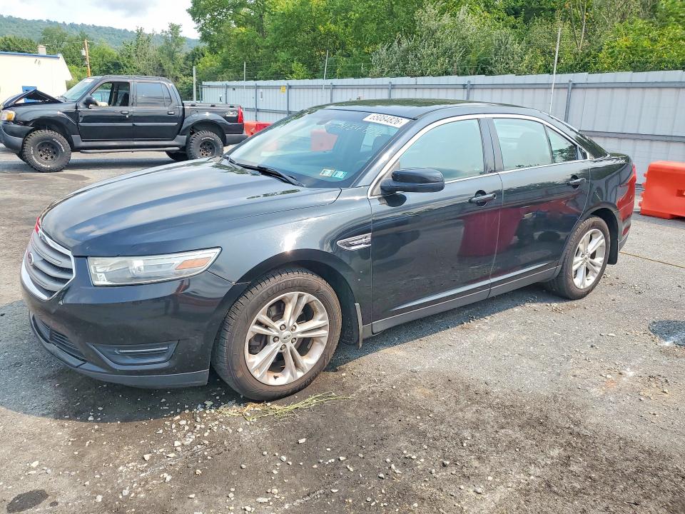 FORD TAURUS 2014 with VIN 1FAHP2E88EG154453 - Photo from auction