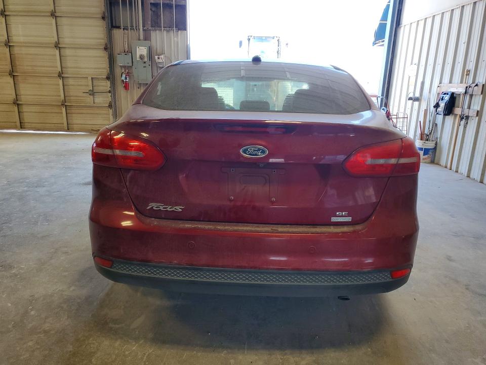 Foto 6 de la subasta – 2016 FORD FOCUS con VIN 1FADP3FE4GL234464