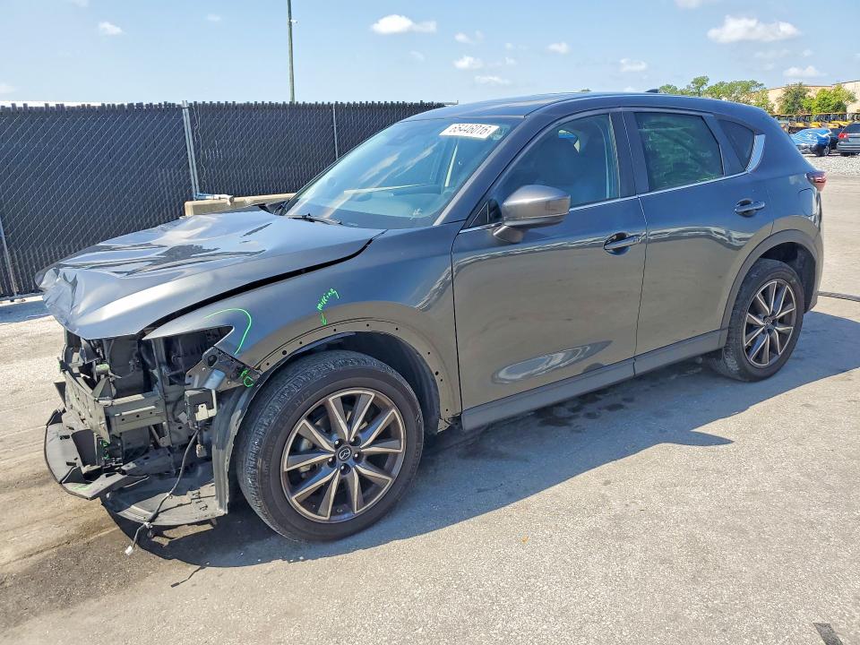 MAZDA CX-5 2018 with VIN JM3KFACM6J1402958 - Photo from auction