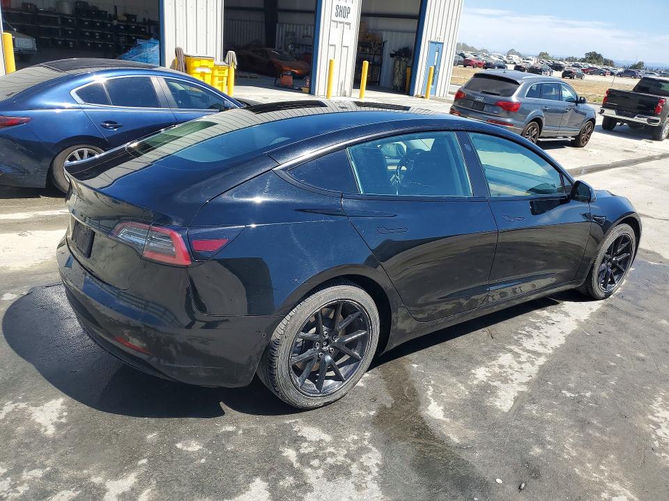 Photo 3 from auction – 2022 TESLA MODEL 3 with VIN 5YJ3E1EA8NF285738