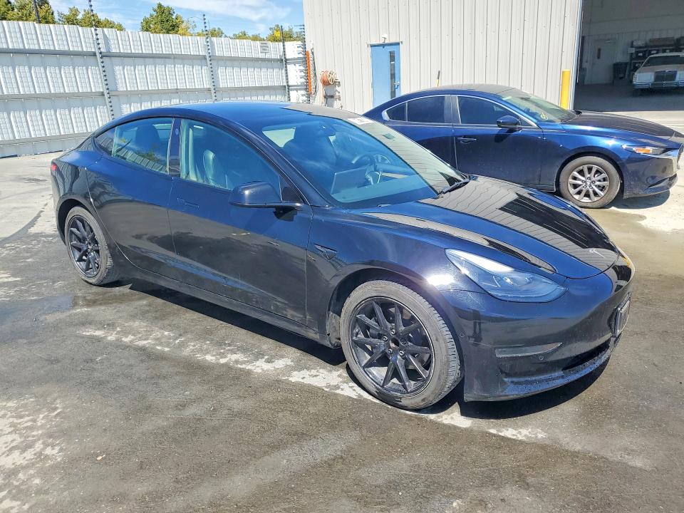 Photo 4 from auction – 2022 TESLA MODEL 3 with VIN 5YJ3E1EA8NF285738