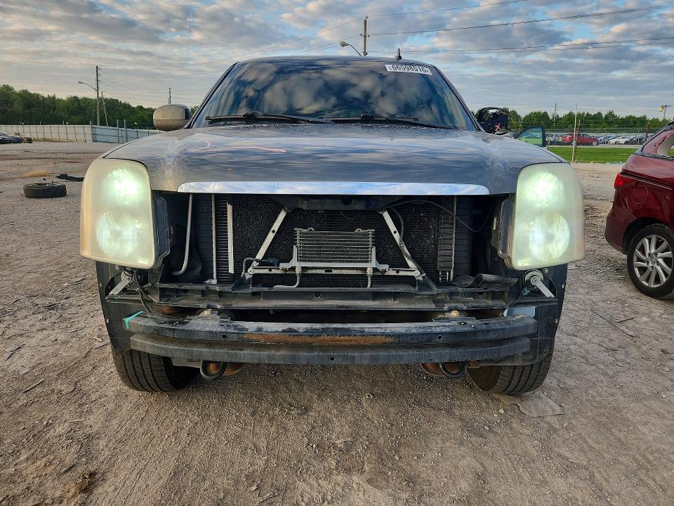 Photo 5 from auction – 2011 GMC YUKON XL with VIN 1GKS2MEF7BR206104