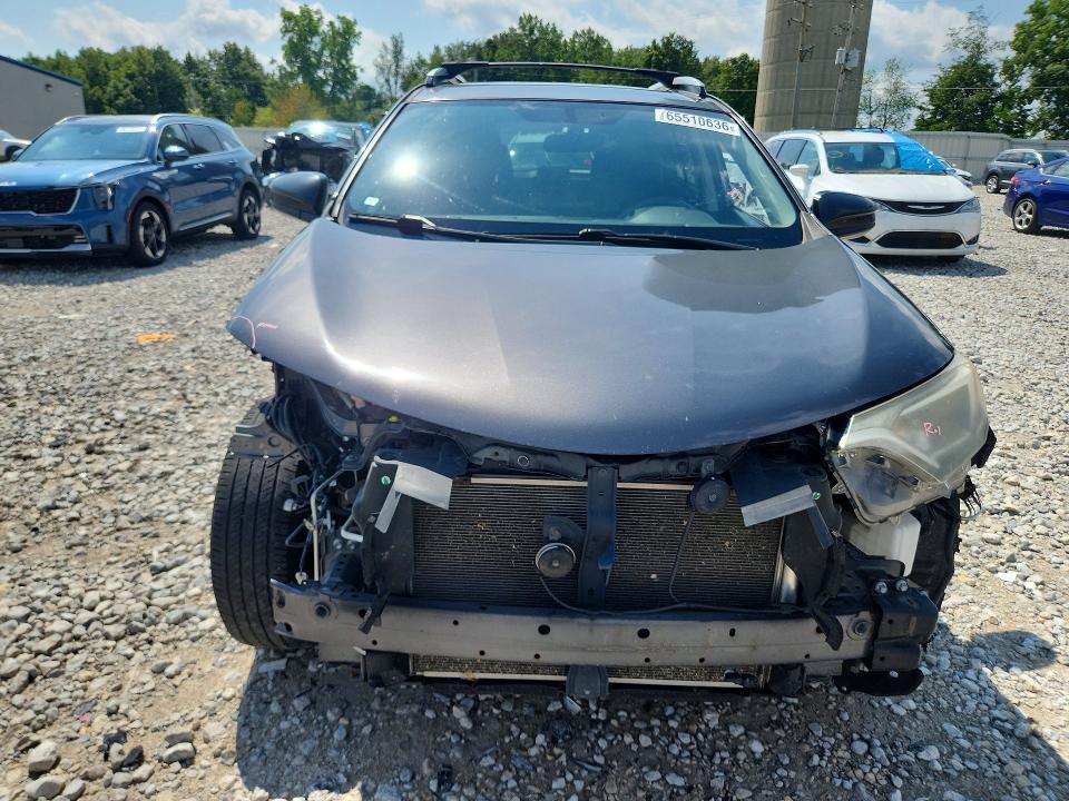Photo 5 from auction – 2016 TOYOTA RAV4 with VIN JTMZFREV0GJ072206
