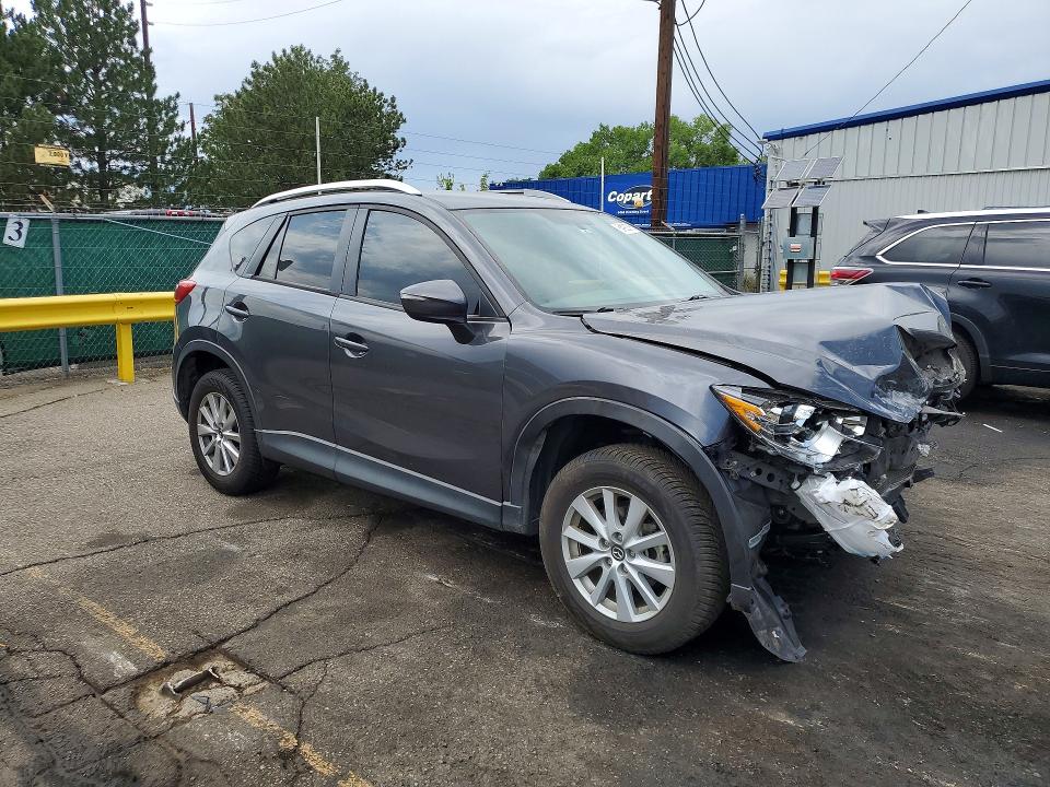 Photo 4 from auction – 2016 MAZDA CX-5 with VIN JM3KE4CY8G0826938
