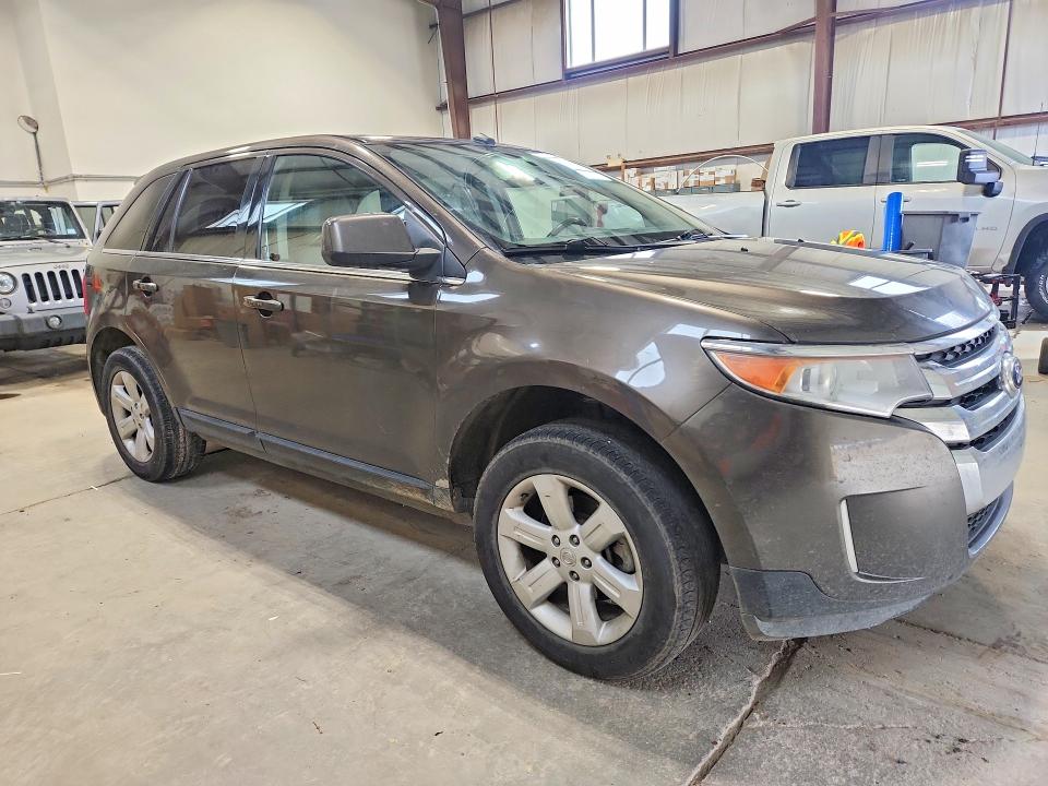 Photo 4 from auction – 2011 FORD EDGE with VIN 2FMDK4KCXBBA40187