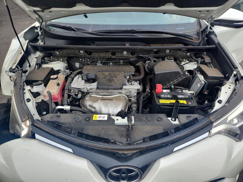 Photo 11 from auction – 2018 TOYOTA RAV4 with VIN JTMDFREV7JJ733084