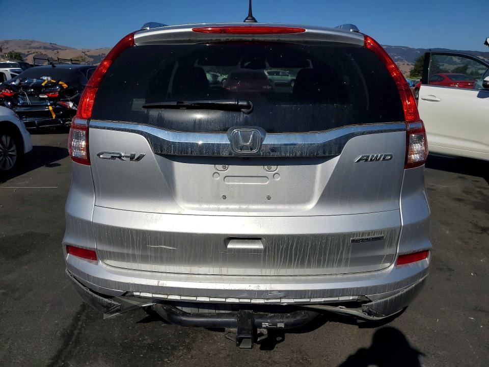 Photo 6 from auction – 2016 HONDA CR-V with VIN 5J6RM4H96GL042777