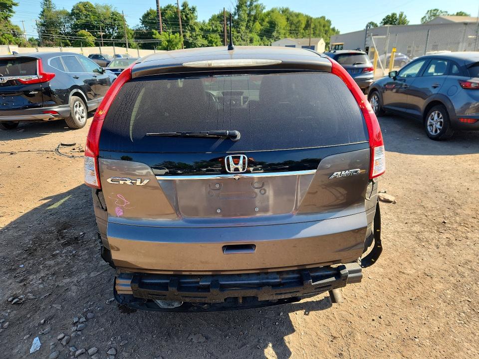 Photo 6 from auction – 2013 HONDA CR-V with VIN 5J6RM4H56DL040424
