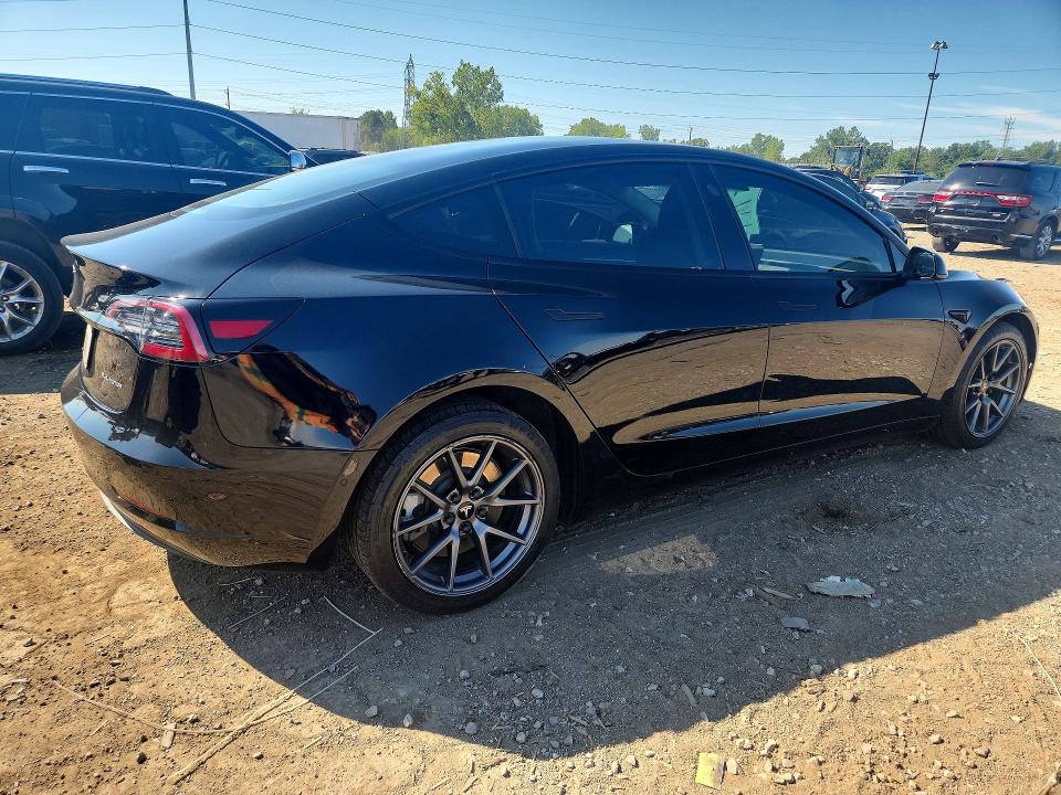 Photo 3 from auction – 2022 TESLA MODEL 3 with VIN 5YJ3E1EB9NF119057
