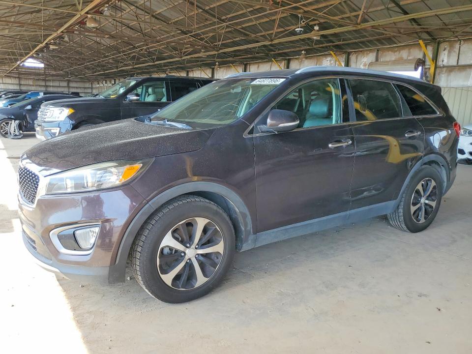 KIA SORENTO 2016 with VIN 5XYPH4A55GG105775 - Photo from auction