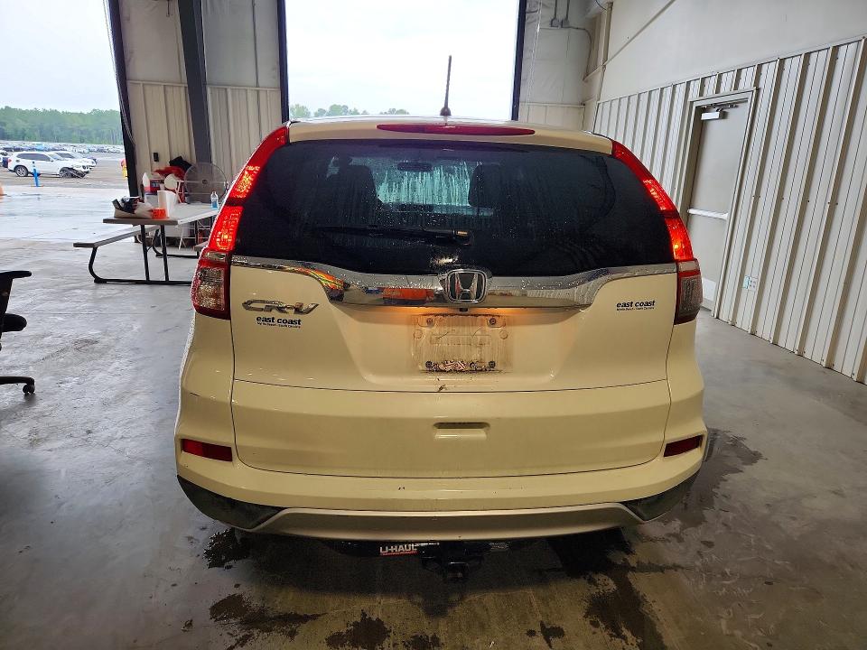 Photo 6 from auction – 2016 HONDA CR-V with VIN 5J6RM3H50GL017204