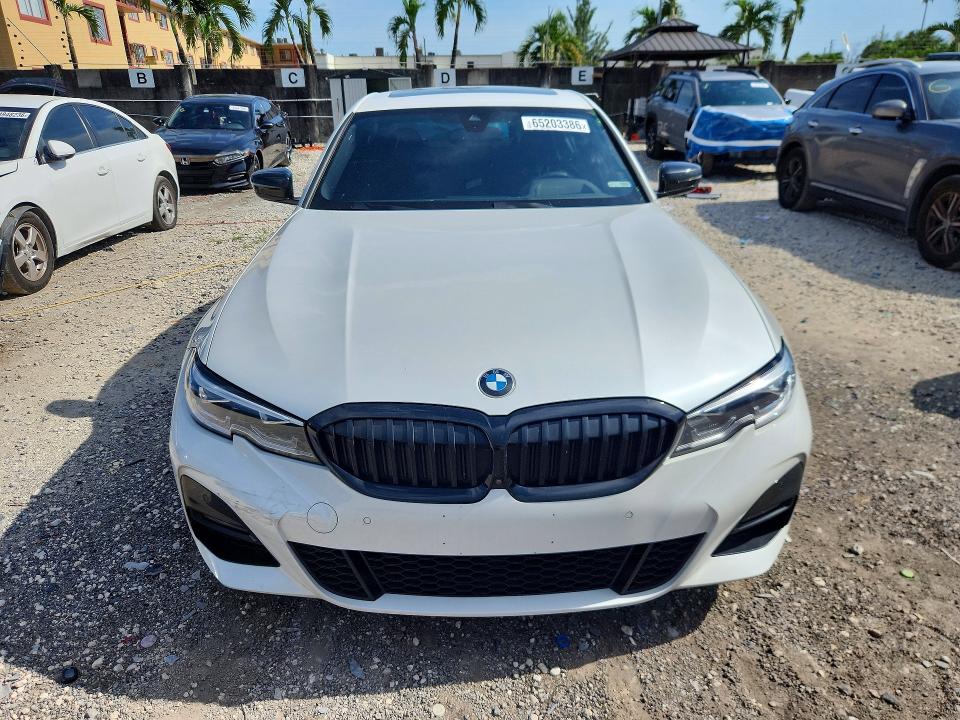Photo 5 from auction – 2021 BMW 330XI with VIN 3MW5R7J07M8C00921