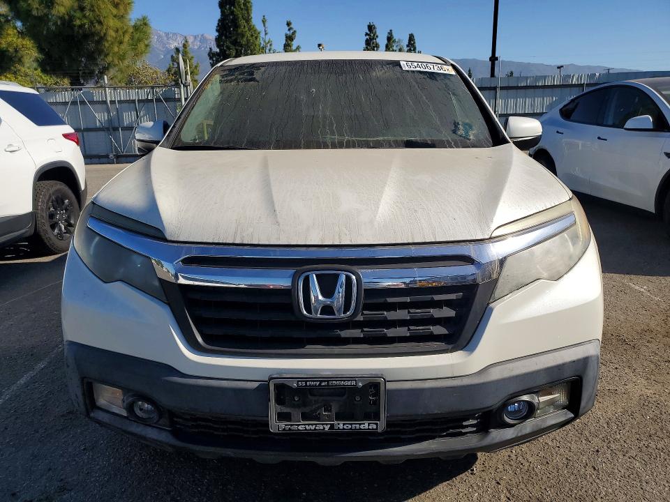 Photo 5 from auction – 2018 HONDA RIDGELINE with VIN 5FPYK2F69JB000612