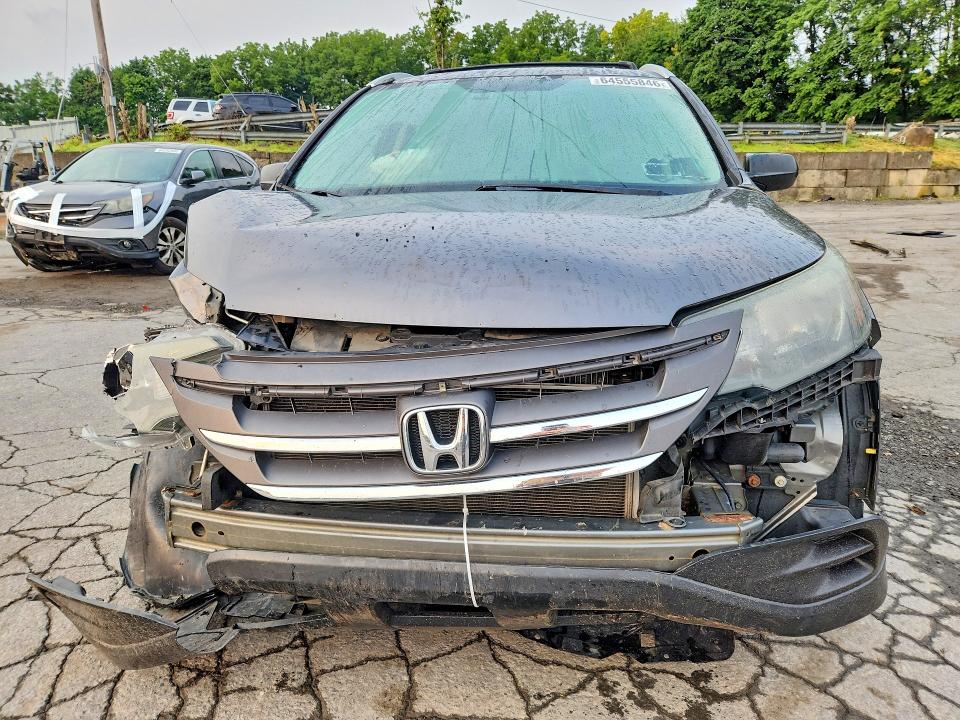 Photo 5 from auction – 2014 HONDA CR-V with VIN 2HKRM4H3XEH606188