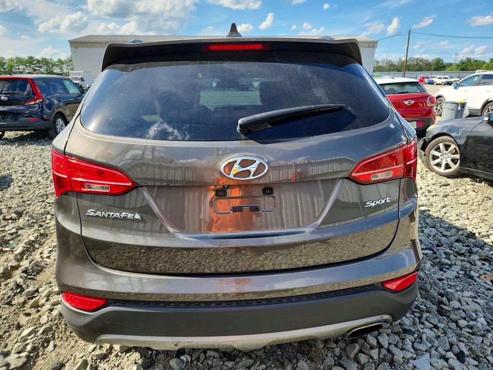 Photo 6 from auction – 2014 HYUNDAI SANTA FE SPORT with VIN 5XYZU3LB8EG143922