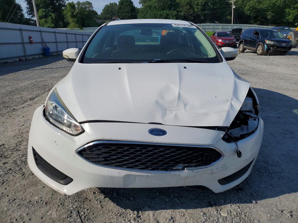 Photo 5 from auction – 2016 FORD FOCUS with VIN 1FADP3F29GL266154