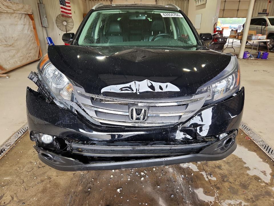 Photo 5 from auction – 2013 HONDA CR-V with VIN 2HKRM4H78DH682400