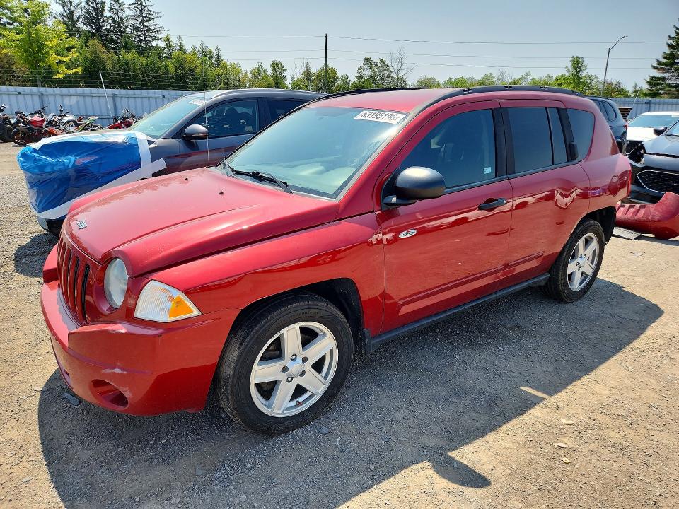 JEEP COMPASS 2009 with VIN 1J8FT47B39D211322 - Photo from auction