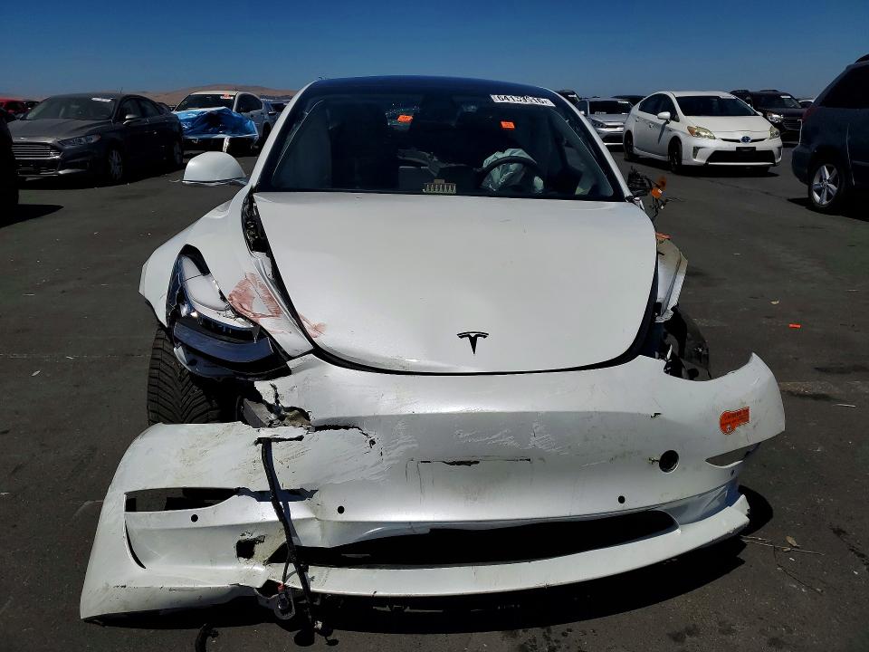 Photo 5 from auction – 2020 TESLA MODEL 3 with VIN 5YJ3E1EA9LF613939