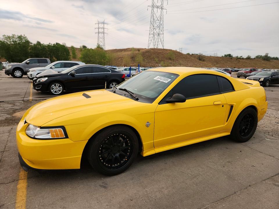 FORD MUSTANG 1999 with VIN 1FAFP42X2XF136019 - Photo from auction