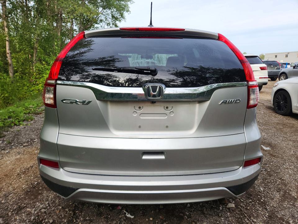 Photo 6 from auction – 2016 HONDA CR-V with VIN 2HKRM4H78GH128276