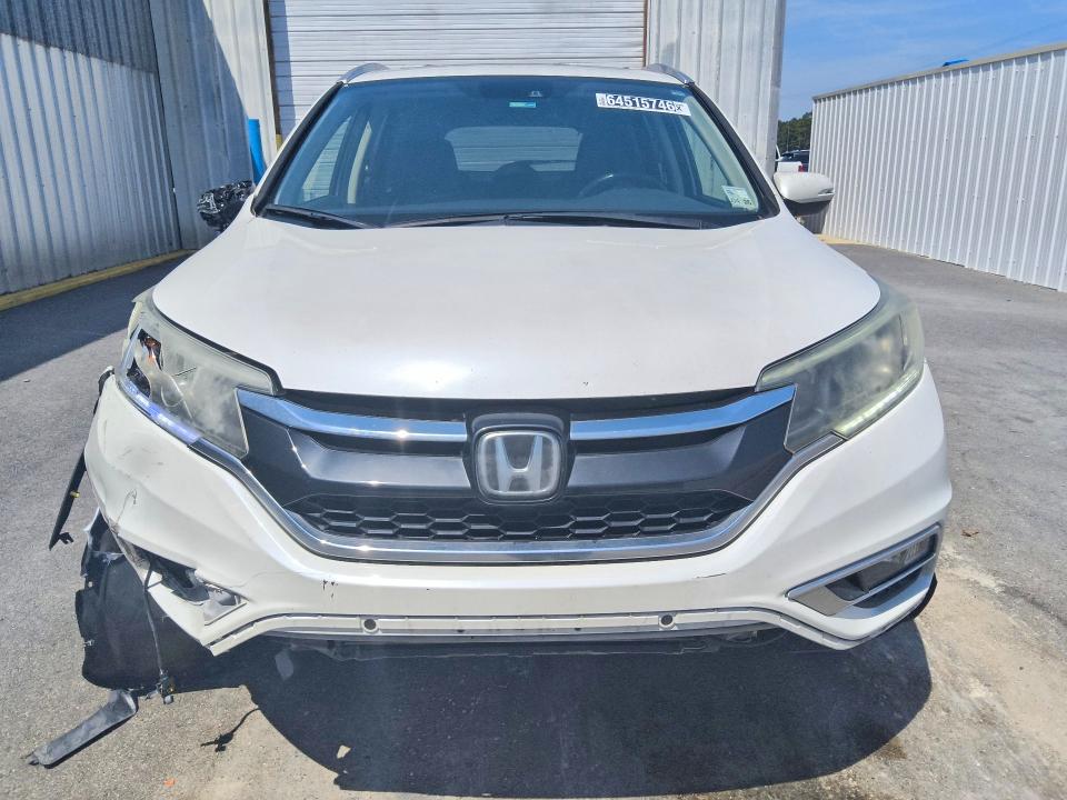 Photo 5 from auction – 2016 HONDA CR-V with VIN 5J6RM4H91GL048065