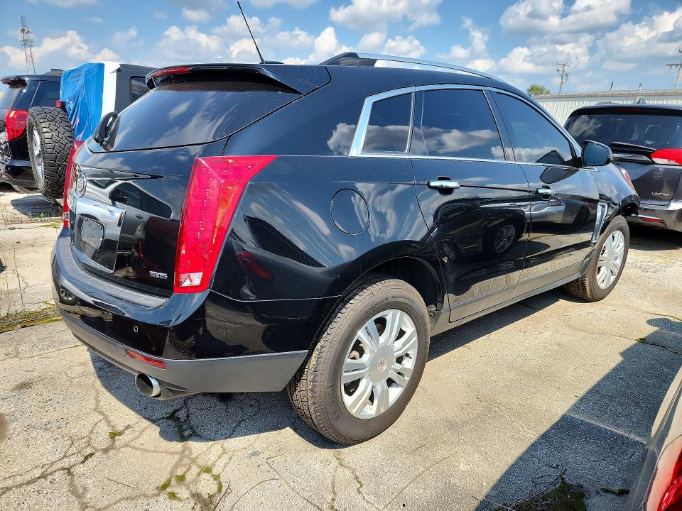Photo 3 from auction – 2015 CADILLAC SRX with VIN 3GYFNBE3XFS555561