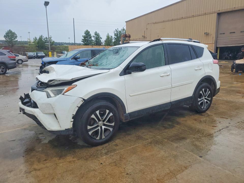 TOYOTA RAV4 2016 with VIN JTMZFREV9GJ099565 - Photo from auction