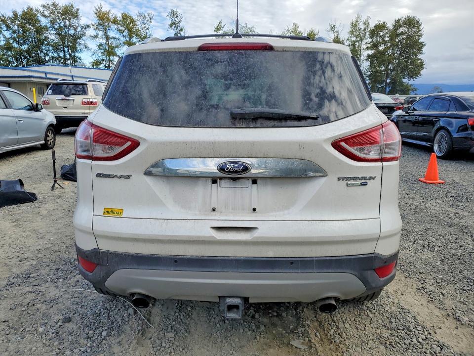 Photo 6 from auction – 2014 FORD ESCAPE with VIN 1FMCU9J98EUD02053