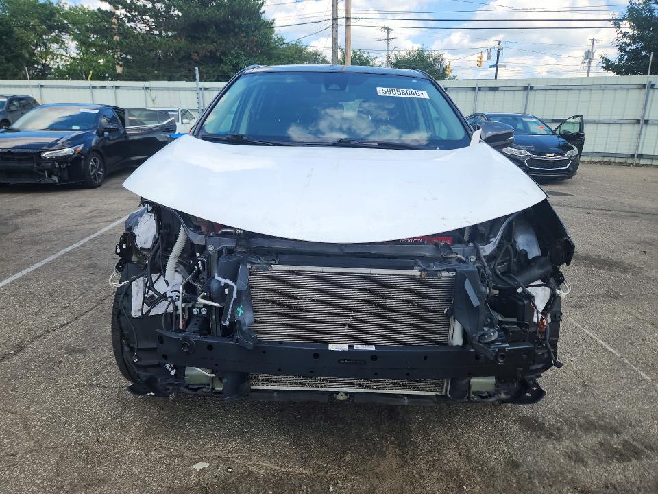 Photo 5 from auction – 2018 TOYOTA RAV4 with VIN 2T3RFREV5JW797910