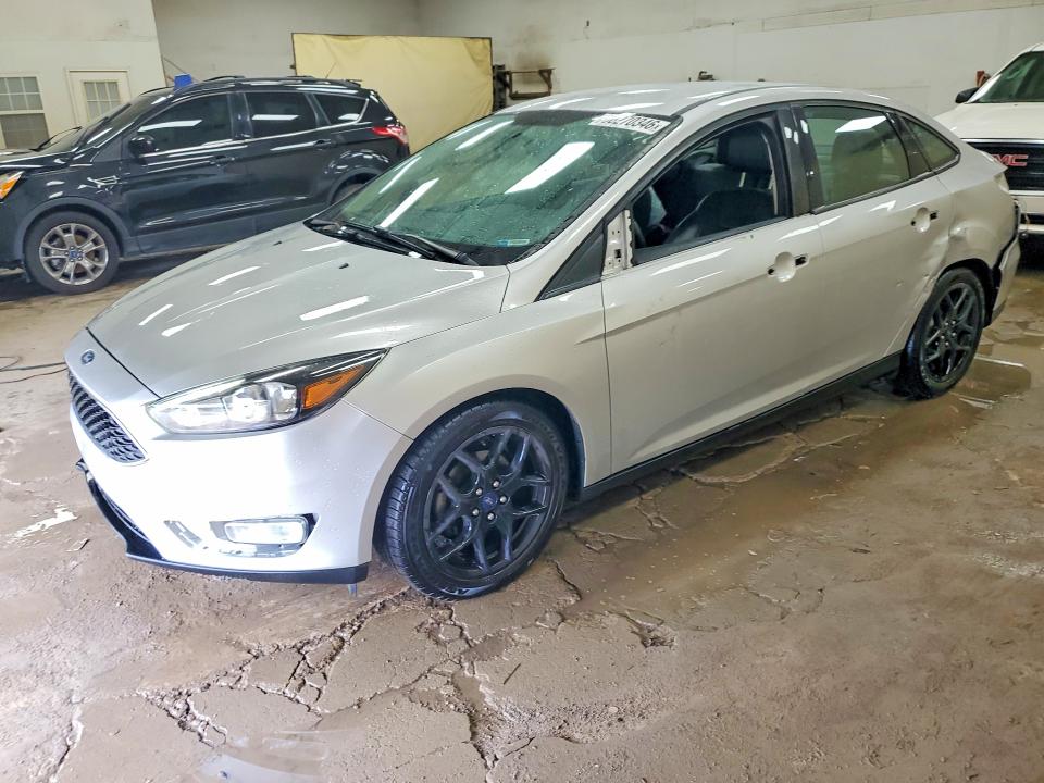 FORD FOCUS 2016 with VIN 1FADP3F27GL238854 - Photo from auction