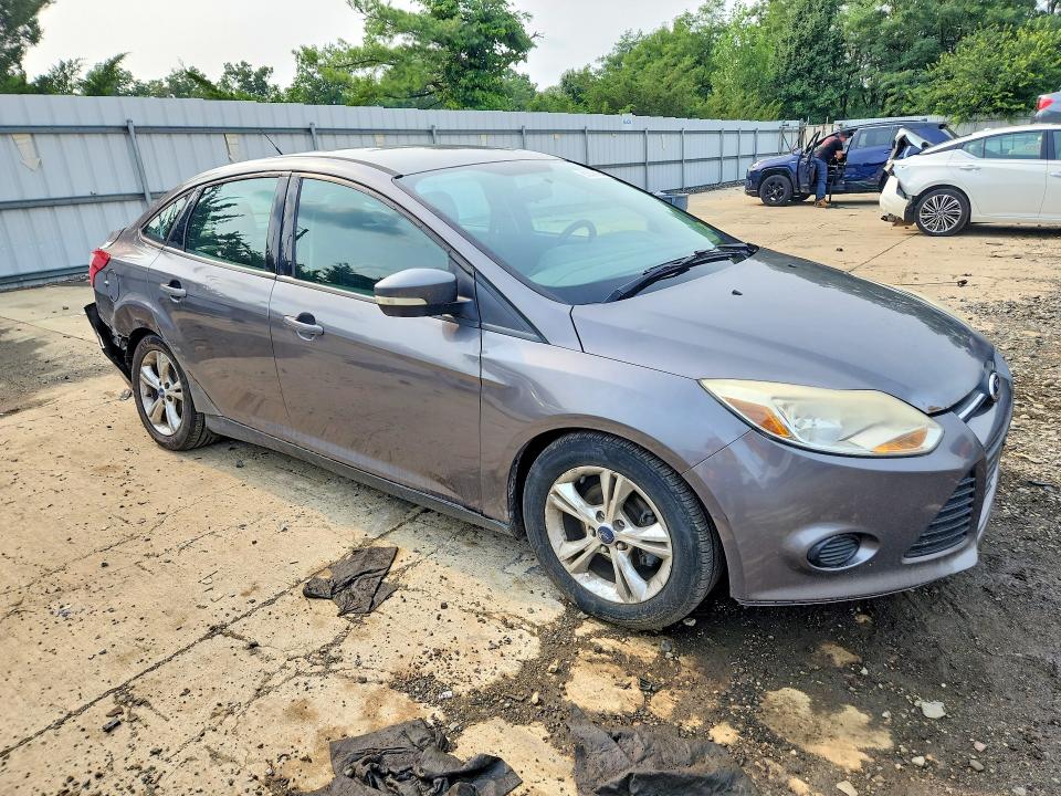 Photo 4 from auction – 2014 FORD FOCUS with VIN 1FADP3F27EL102124