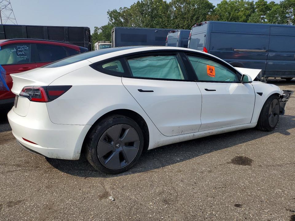 Photo 3 from auction – 2023 TESLA MODEL 3 with VIN 5YJ3E1EA4PF553977
