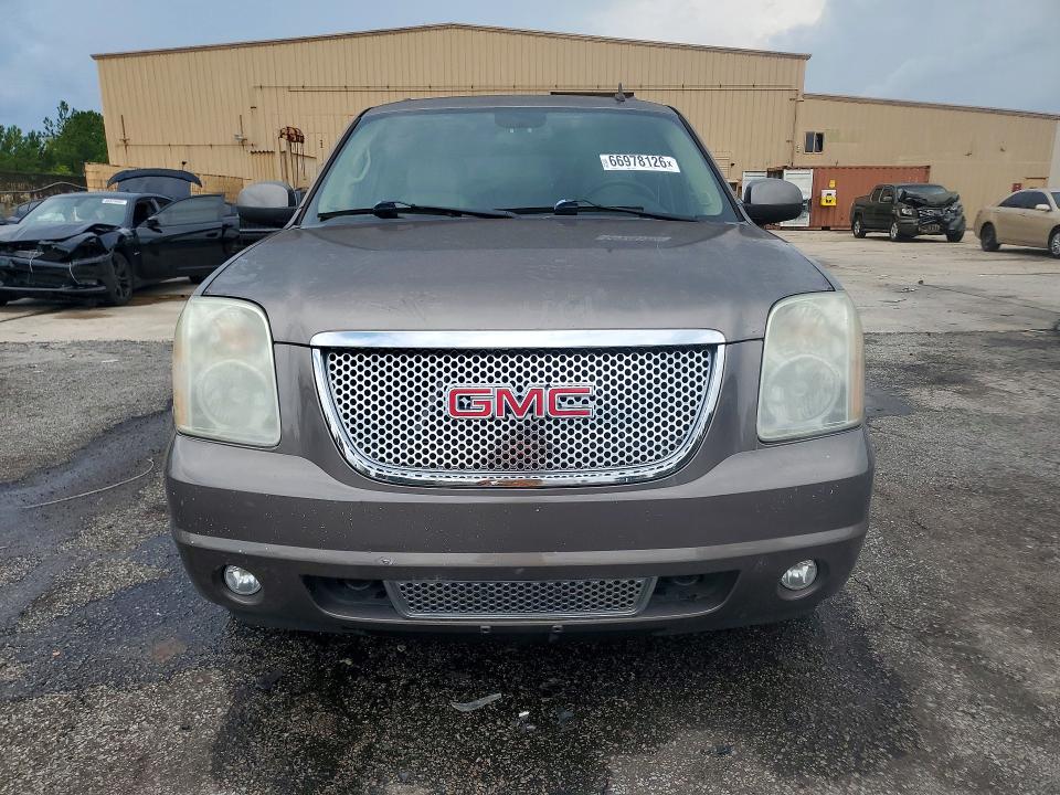 Photo 5 from auction – 2011 GMC YUKON with VIN 1GKS2GEJ6BR193142