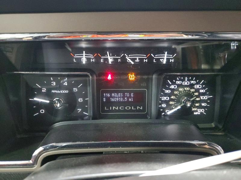 Photo 9 from auction – 2014 LINCOLN NAVIGATOR with VIN 5LMJJ2J59EEL02591
