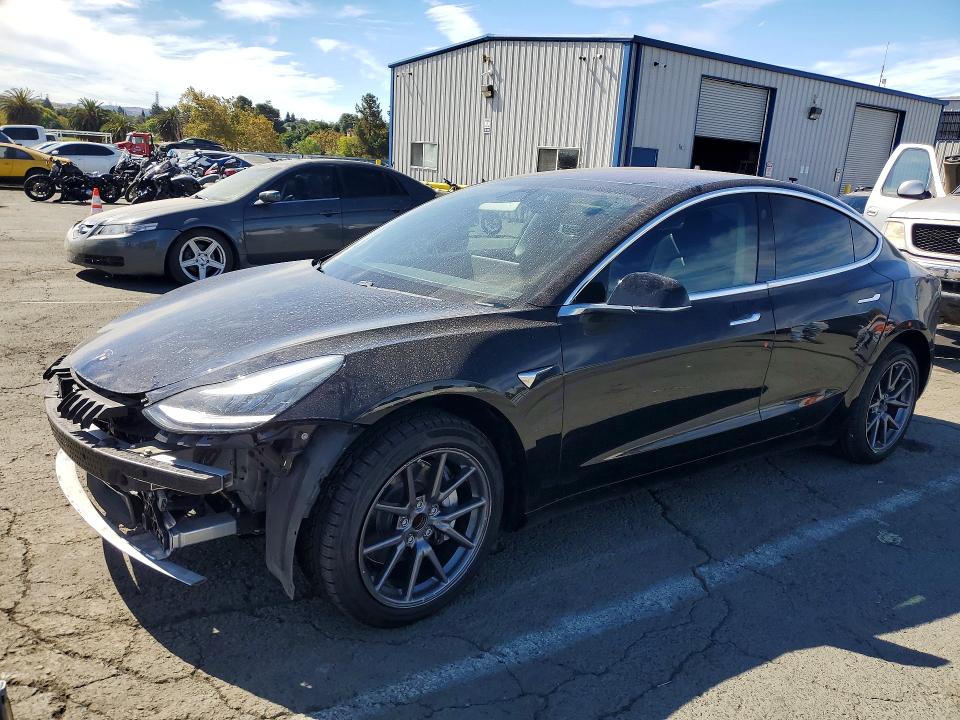 TESLA MODEL 3 2018 with VIN 5YJ3E1EA3JF165940 - Photo from auction