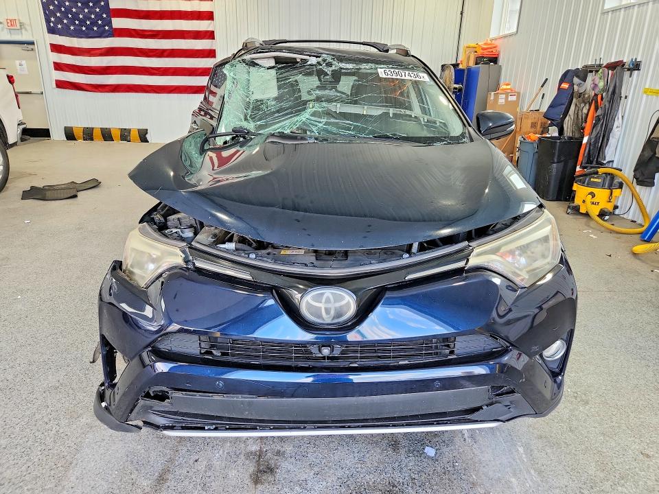 Photo 5 from auction – 2018 TOYOTA RAV4 with VIN JTMDFREV0JJ190497