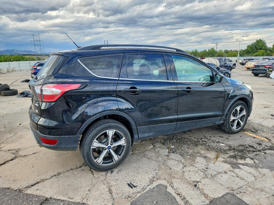 Photo 3 from auction – 2017 FORD ESCAPE with VIN 1FMCU9G99HUD80661