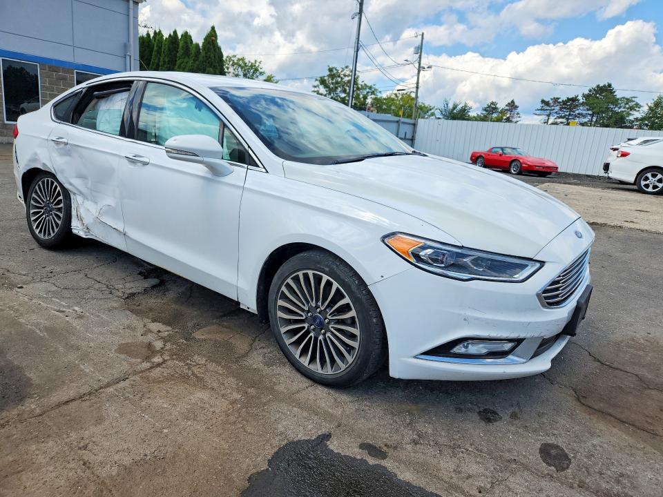 Photo 4 from auction – 2017 FORD FUSION with VIN 3FA6P0K90HR115250