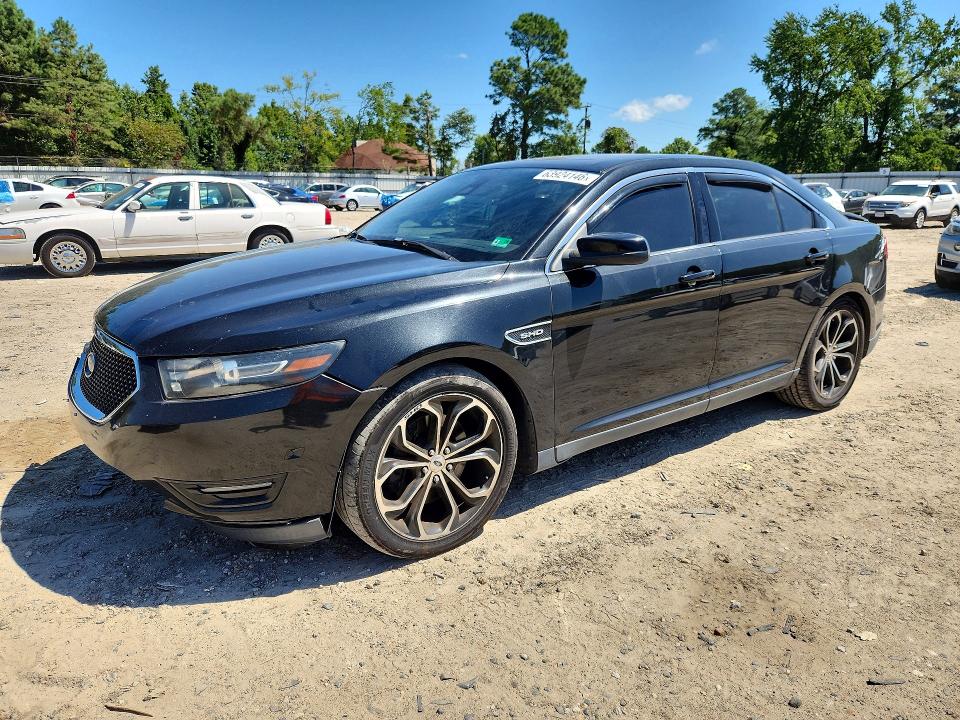 FORD TAURUS 2013 with VIN 1FAHP2KT9DG137717 - Photo from auction