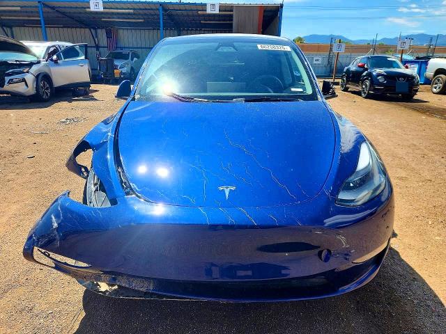 Photo 5 from auction – 2023 TESLA MODEL Y with VIN 7SAYGDEE1PF971341