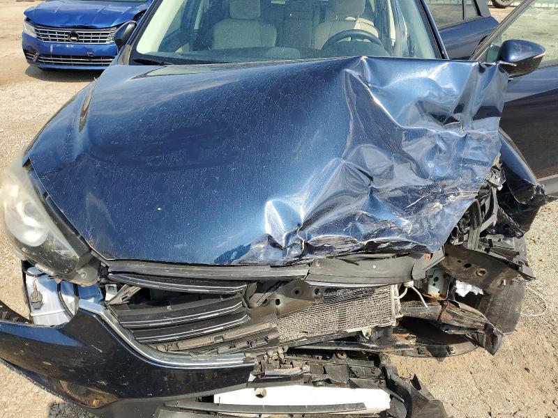 Photo 12 from auction – 2016 MAZDA CX-5 with VIN JM3KE2CY9G0734127