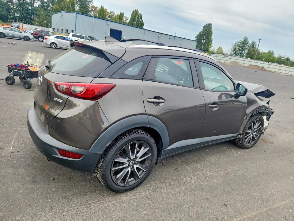 Photo 3 from auction – 2018 MAZDA CX-3 with VIN JM1DKFC71J0303328