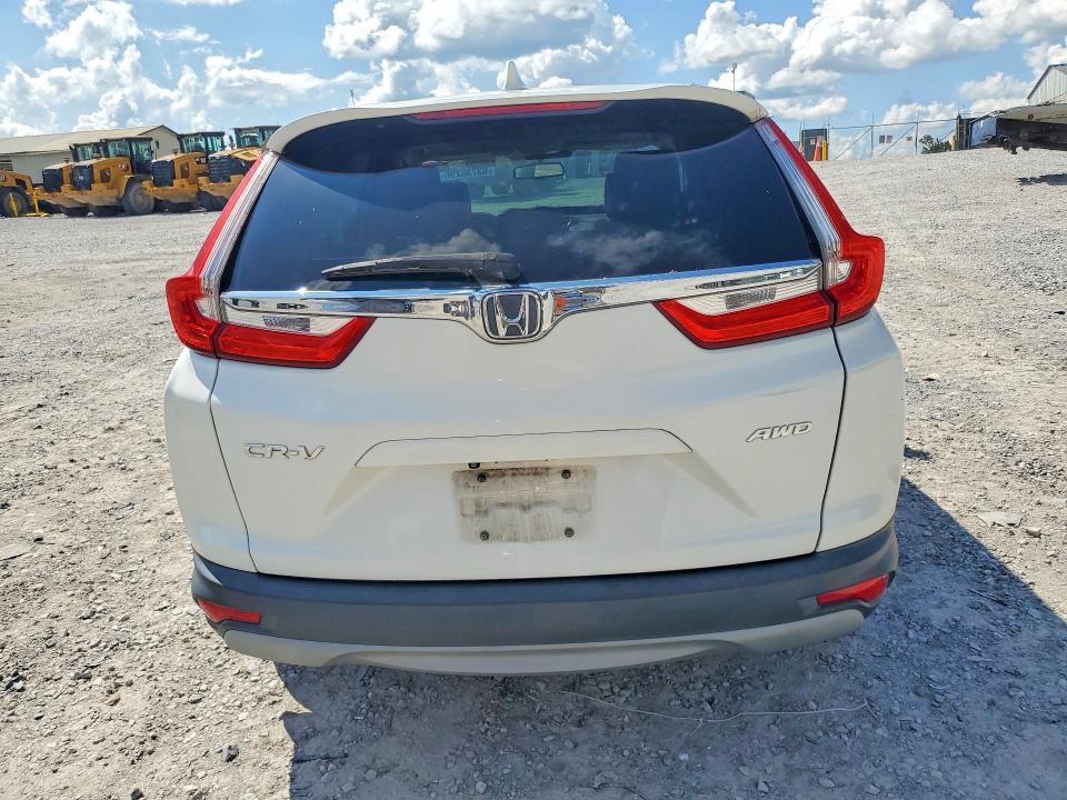 Photo 6 from auction – 2018 HONDA CR-V with VIN 2HKRW2H80JH612957
