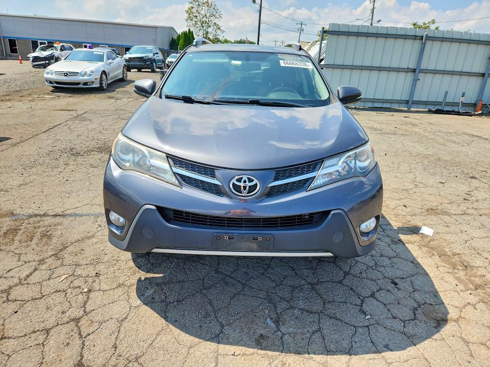 Photo 5 from auction – 2015 TOYOTA RAV4 with VIN JTMDFREV7FD172830