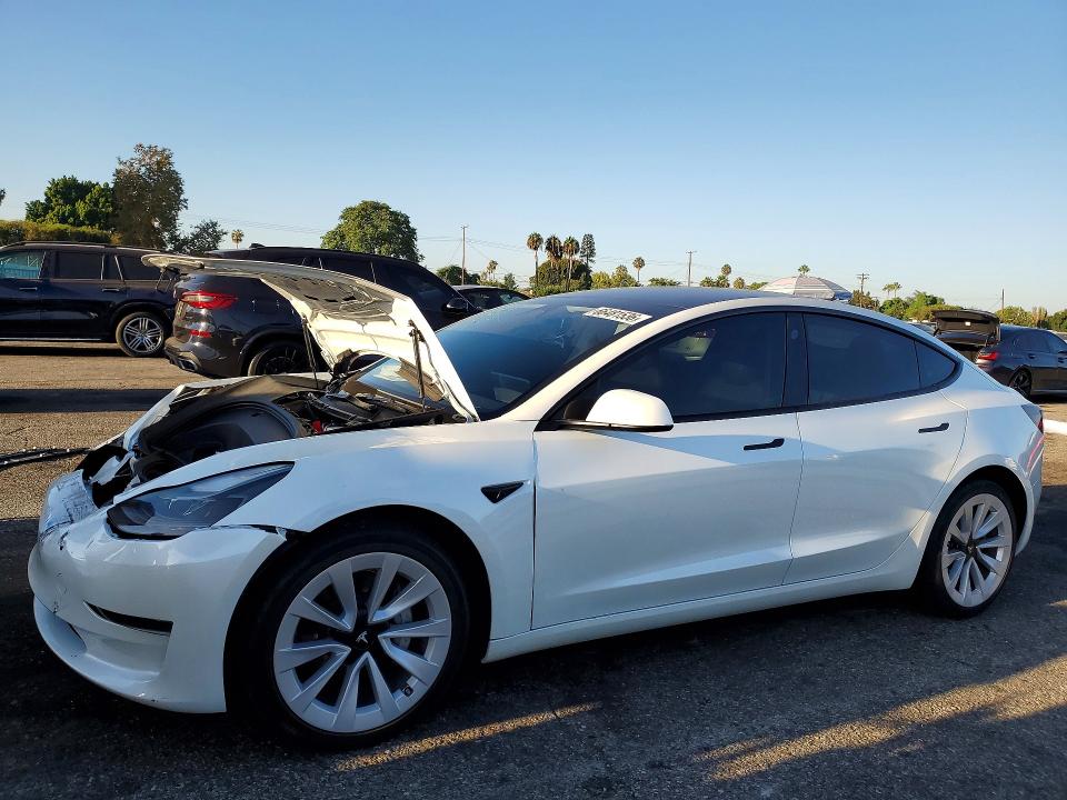 TESLA MODEL 3 2023 with VIN 5YJ3E1EA7PF510587 - Photo from auction