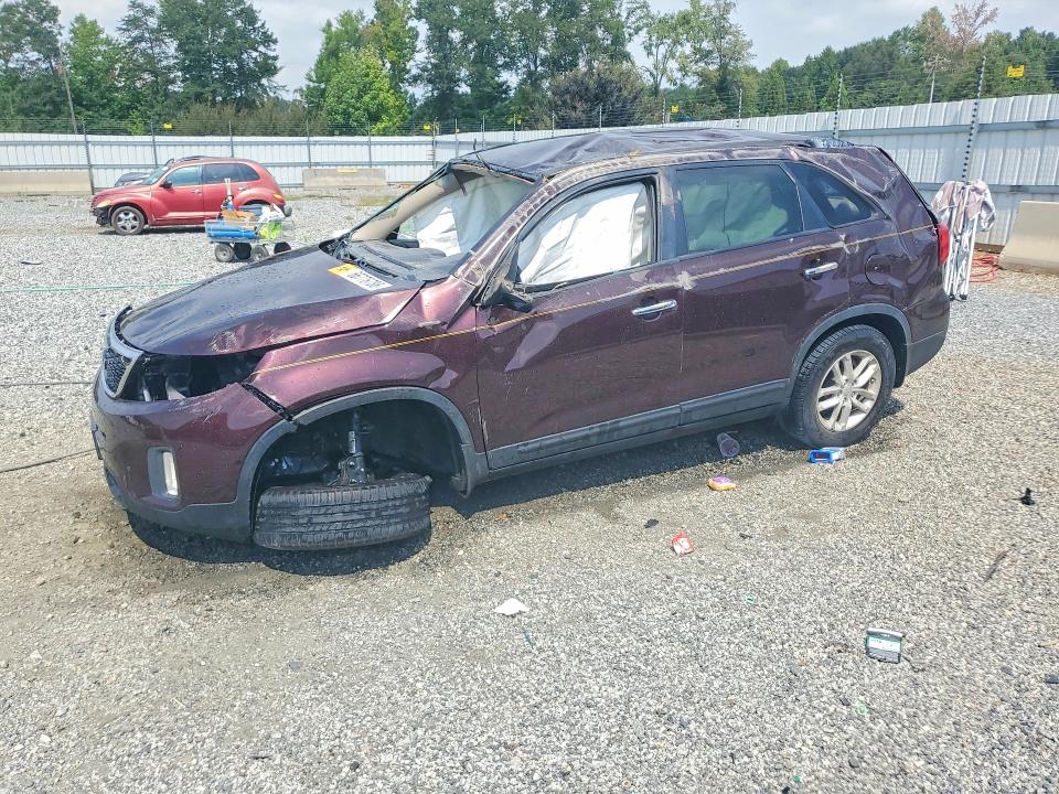 KIA SORENTO 2015 with VIN 5XYKT3A64FG633088 - Photo from auction