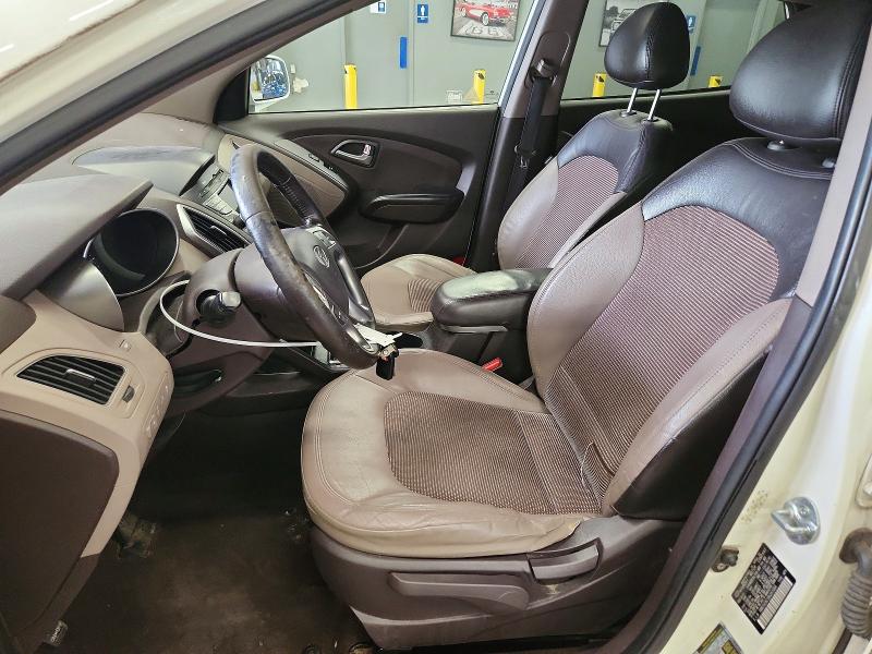 Photo 7 from auction – 2011 HYUNDAI TUCSON with VIN KM8JUCAC1BU261664
