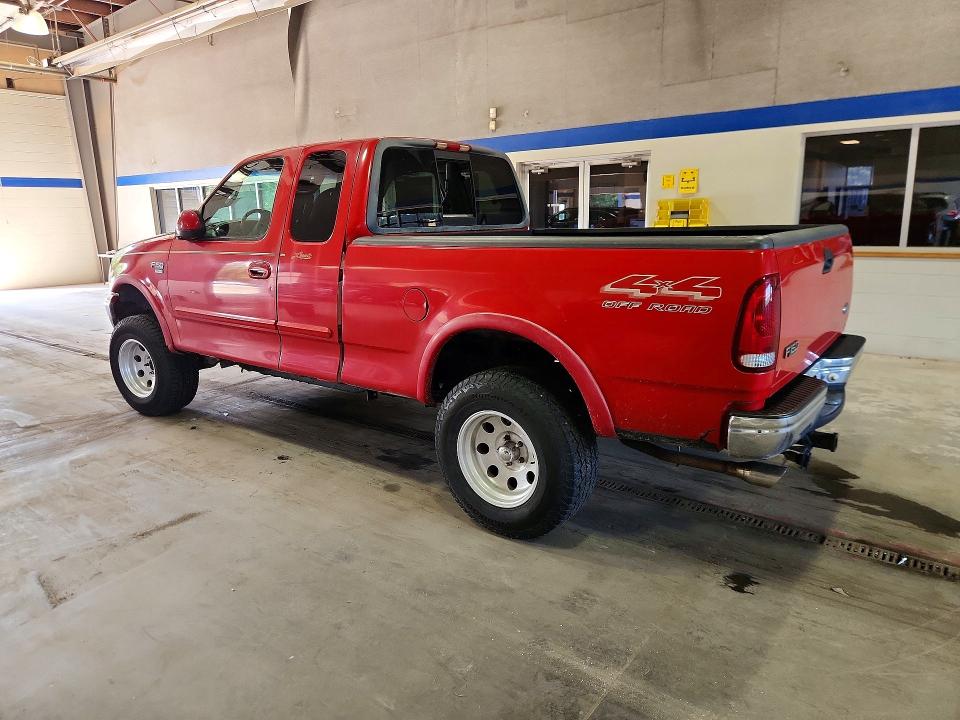 Photo 2 from auction – 2000 FORD F150 with VIN 1FTRX18LXYNB64037
