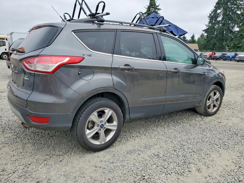 Photo 3 from auction – 2016 FORD ESCAPE with VIN 1FMCU9G92GUC60666